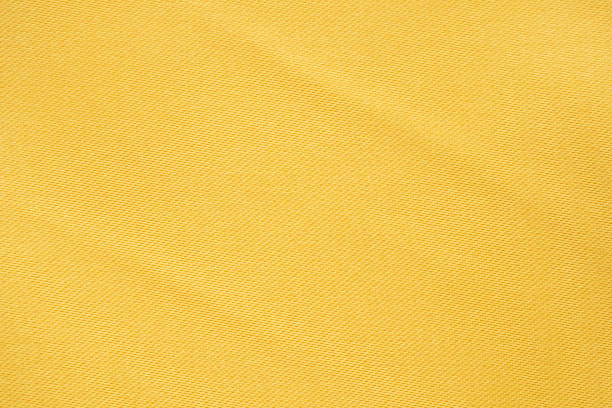 istock Abstract luxury gold fabric with soft wave texture background 1357785674