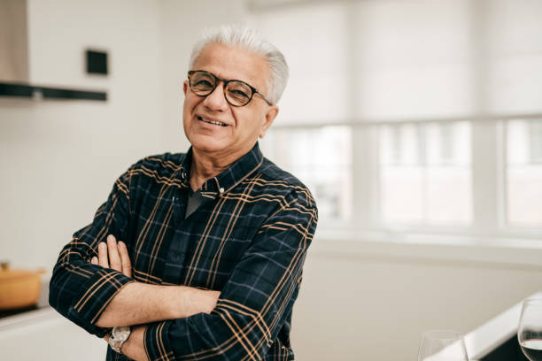istock Senior man smiling to the camera 1357785725