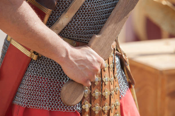 istock Soldier wielding a wooden training sword 1357787261