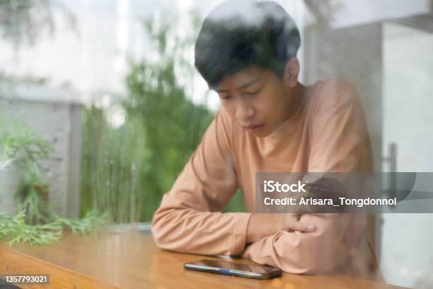 Asian Boy Student Using Smartphone Stock Photo - Download Image Now - Teenage Boys, Thai Culture, Thailand