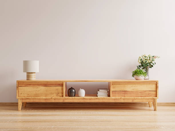 istock Cabinet for tv interior in white wall mockup. 1357802054