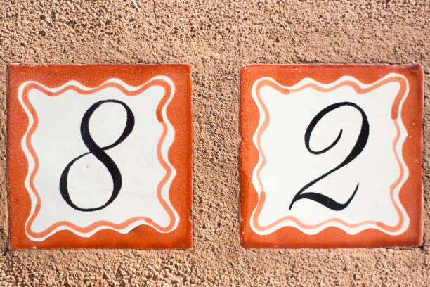 istock Ceramic Number 29 Street Address Tiles; Brown Wall 1357802061