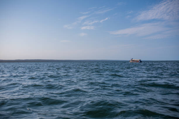 Sopot, Poland - October 5, 2024: The passenger ship from the early 1980s, named Onyx, maneuvers in the waters of the Baltic Sea, Gulf of Gdansk, next to the pier.