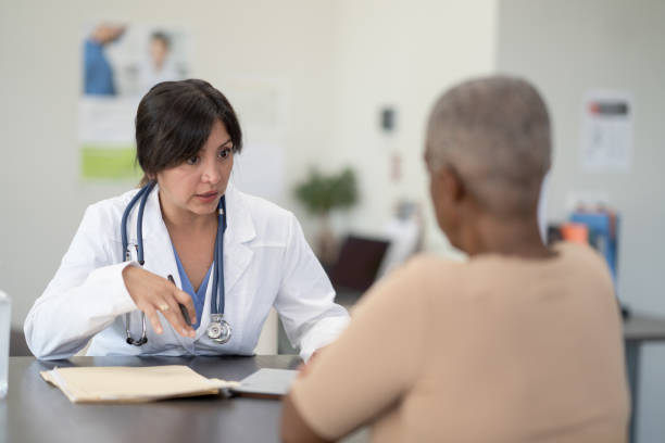 istock Doctor in an Appointment with a Senior Patient 1357807781