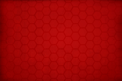 Blank empty, horizontal vector illustration of a dark red color gradient grunge backgrounds with benzene ring type hexagon pattern all over. There is no text, no people and copy space.