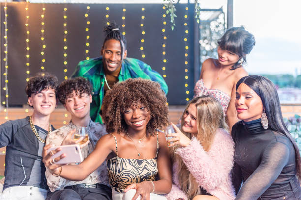 istock Friends in new year's eve taking a selfie 1357810023