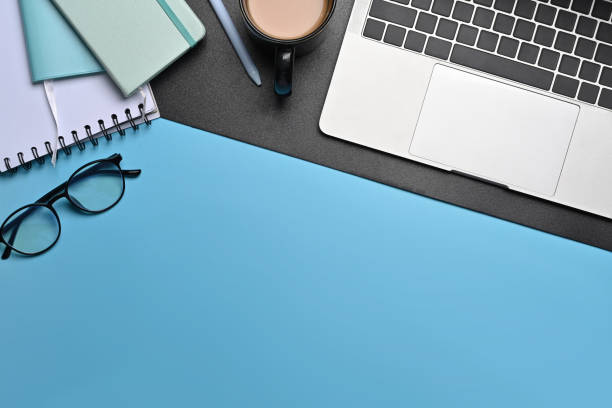 istock Designer workspace with laptop computer, notebook and cup of coffee. 1357813133