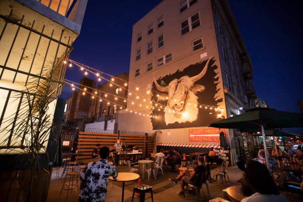 Downtown Stockton Stockton, California, USA - July 15, 2021: Twilight descends on a vibrant downtown scene. stockton california stock pictures, royalty-free photos & images