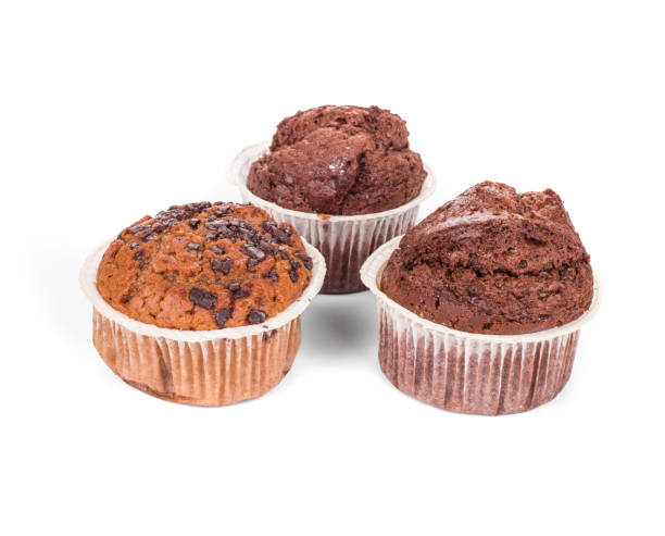 istock One chocolate chip muffin and two chocolate muffins. 1357815235