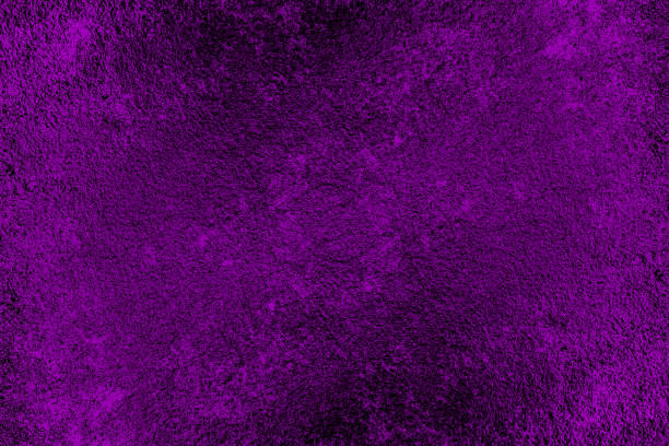 istock Magenta color metal surface with heavy grunge texture for background 1357816631