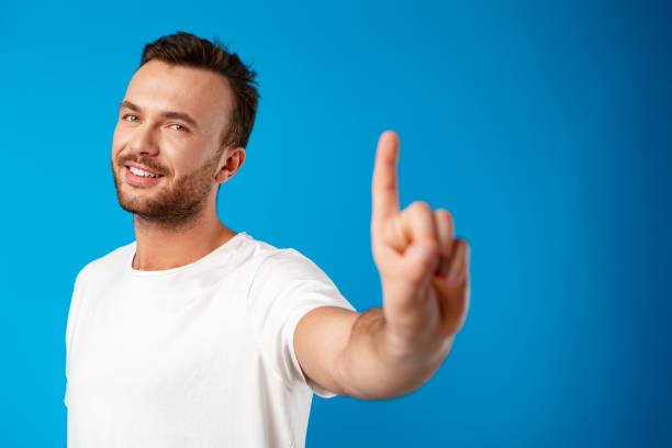 istock Close up of a man hand pointing at camera 1357820724