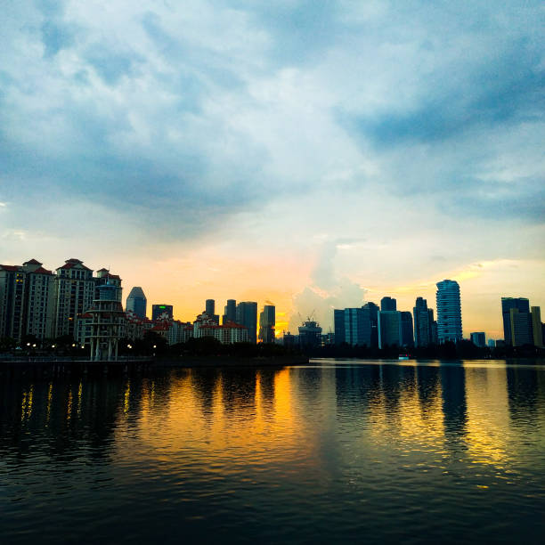 city scape at night with reflection on lake. Thailand. sunset with sky. small lake in city.