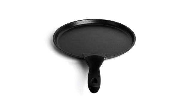 istock Black frying pancake pan isolated on white background 1357824620