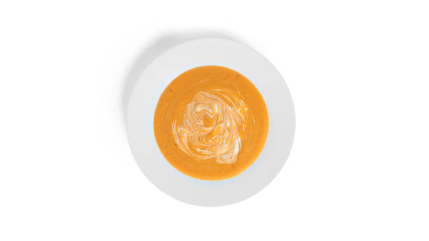 istock Pumpkin cream soup isolated on a white background 1357825354