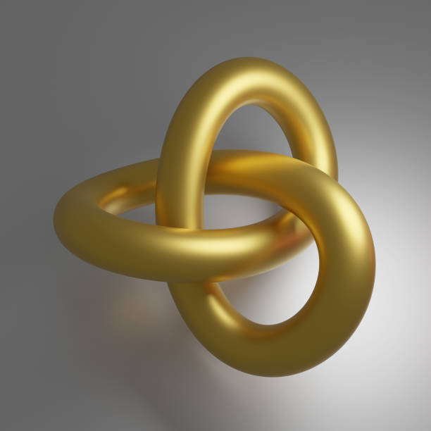 istock A gold wire tied in a knot on a gray background. 1357827937