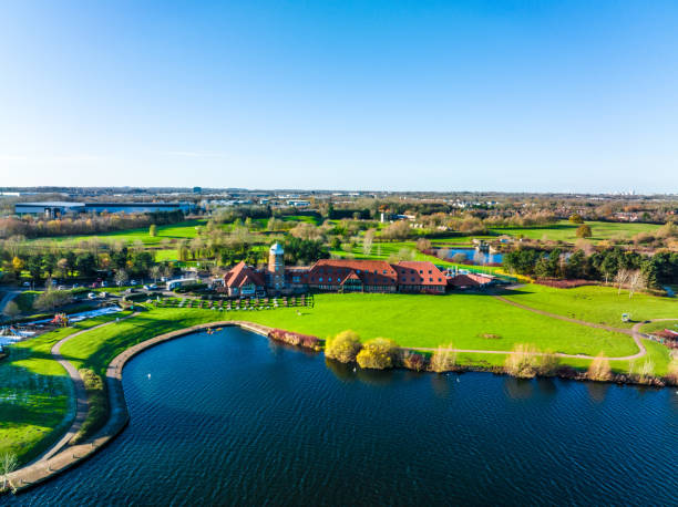 Aerial photo of the village of Milton Keynes in the UK showing a large lake Aerial photo of the village of Milton Keynes in the UK showing a large lake filming point of view highway day road stock pictures, royalty-free photos & images