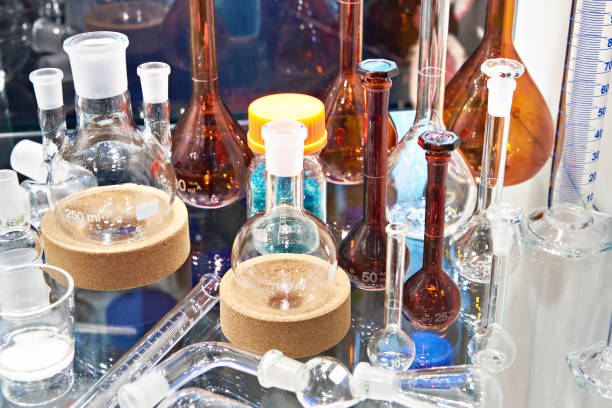 istock Laboratory glass bottles and flasks in store 1357829123