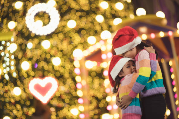 istock Christmas Happy funny sibling hugging 1357832437