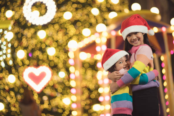 istock Christmas Happy funny sibling hugging 1357832438