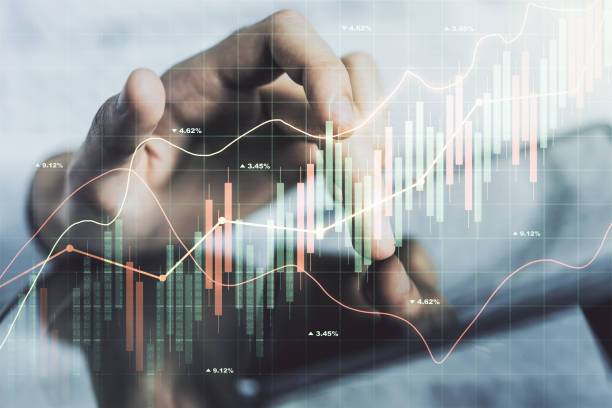 Multi exposure of abstract creative financial chart with finger presses on a digital tablet on background, research and analytics concept stock photo