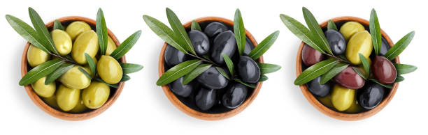 istock Wooden bowls with olives, view from above, on white 1357840478