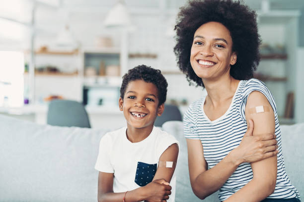 istock Mother and son taking vaccines 1357849127