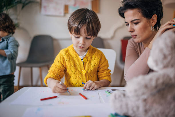 istock Preschool child drawing 1357852937