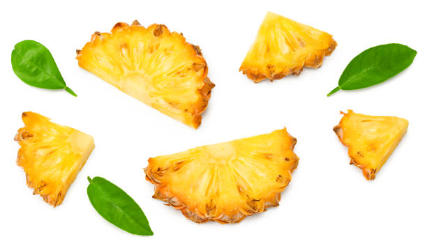 istock sliced pineapple isolated on white background. exotic fruit. clipping path. top view 1357853062