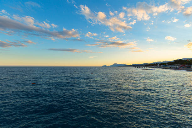 istock beautiful blue sea with mountain views 1357853591