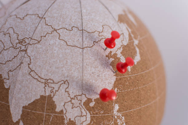 istock cork world ball showing china and with colored thumbtacks · plan destinations · visited places · next destination 1357857365