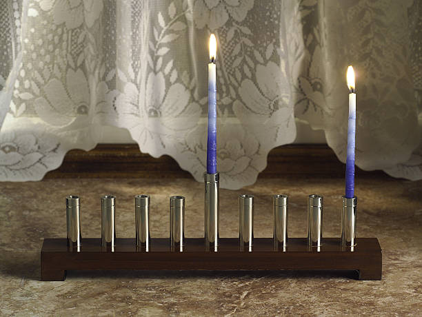 Hanukkah Menorah first night stock photo