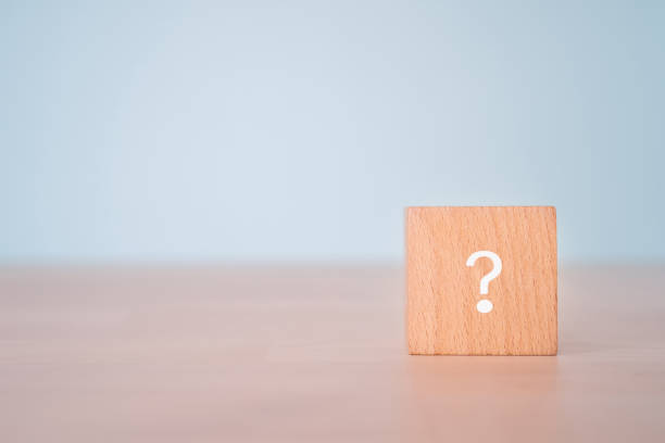 istock A wooden block with a question sign. 1357860722