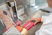 Researcher is doing PCR testing in a laboratory