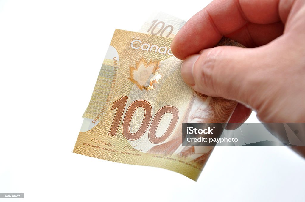Donner une centaine de facture - Photo de Monnaie canadienne libre de droits