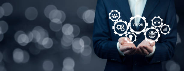 istock businessman holding vision on virtual screens 1357863212
