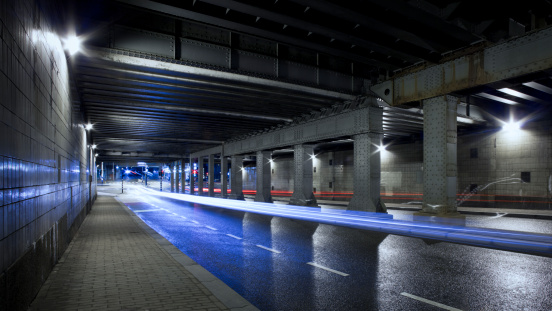 Urban road tunnel with light trails at night, Amsterdam, The Netherlands
