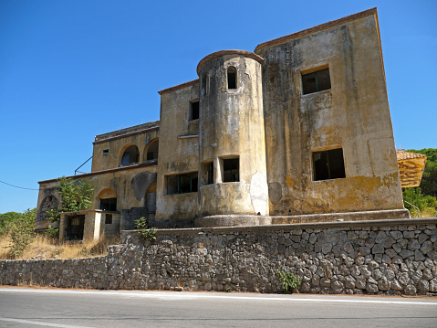 Deserted building of sanatorium in Italian village of Eleousa (Rhodes, Greece)