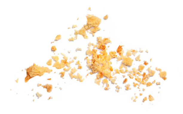 istock Chocolate cookies crumbs  isolated on white background. Top view 1357866986