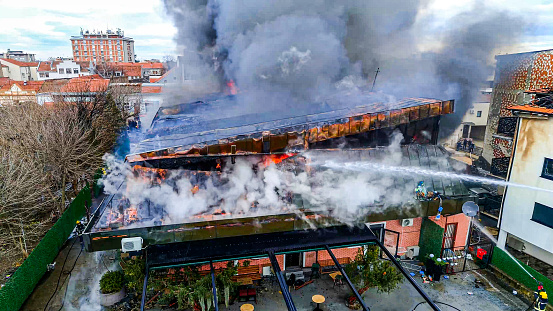 A Chinese shopping center caught fire in Obrenovac near Belgrade, and firefighters are trying to put out the fire.