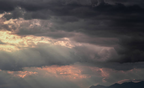 istock Image with clouds before raining in the afternoon and mountains in the background 1357869324