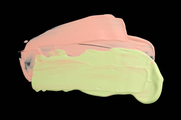istock Pink green painting texture smear blot on black background. 1357870889