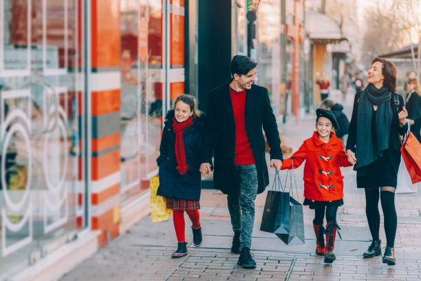 istock Family on Christmas shopping 1357874783