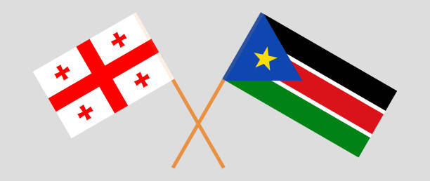 ilustraciones, imágenes clip art, dibujos animados e iconos de stock de banderas cruzadas de georgia y sudán del sur. colores oficiales. proporción correcta - georgia football