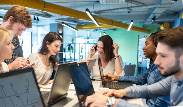istock Young coworkers in modern office 1357878426