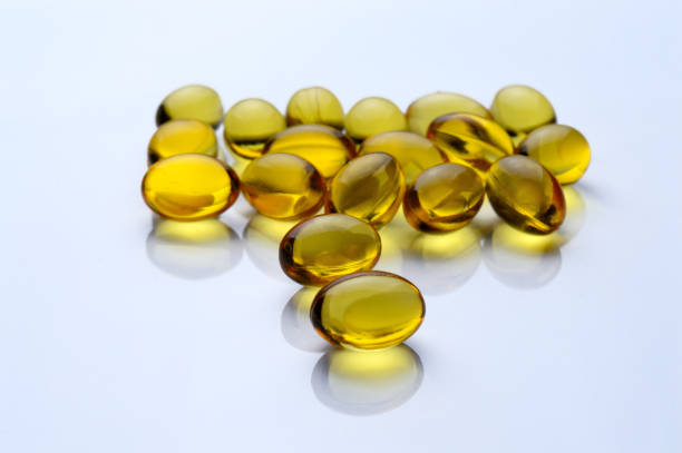 istock Omega 3 Fish Oil Supplement Capsules on a White Background. 1357878772