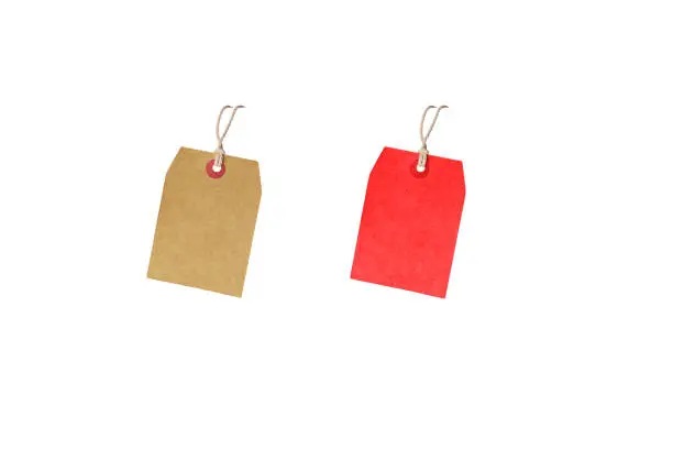 Photo of Natural unbleached and red carboard  price label hanger on  white  background