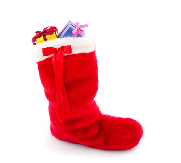 istock Red christmas boot with gifts. 1357881617