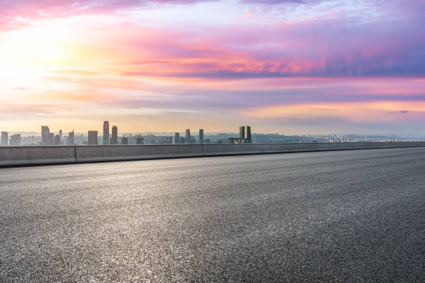 istock Panoramic skyline and modern commercial office buildings with empty road 1357882399