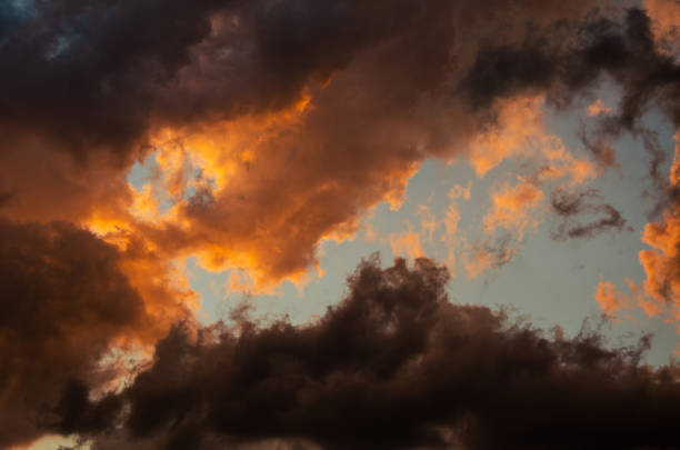istock dramatic clouds. very beautiful clouds. fantastic view of yellow-brown clouds. 1357882968