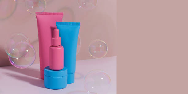 istock Banner different mockups of cosmetic bottles on a pink background surrounded by soap bubbles. Trends in skin care. 1357883025